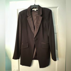 Diane VonFurstenberg black jacket size 12 with satin lapels.